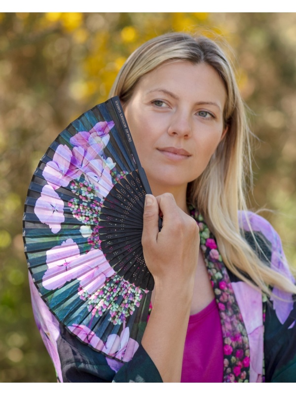 From My Mother's Garden hand opening hand fans are handmade in the traditional Oriental and Japanese style using the exclusive nature-inspired prints from the range. The Hydrangea fan has black spines and and handle with a pink hydrangea print. They come with a matching pouch