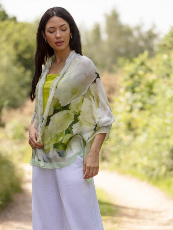 From My Mother's Garden Peace Scarf is made of bamboo and an exclusive print of a white hydrangea