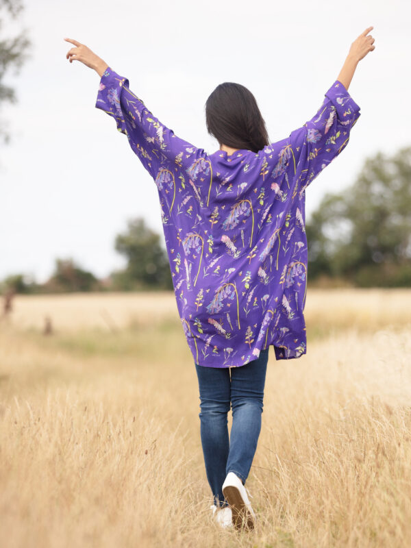 From My Mother's Garden Sew for Bees Mid-Length kimono in a beautiful midnight blue. The print is based on illustrations by nature artist, Alex Boon