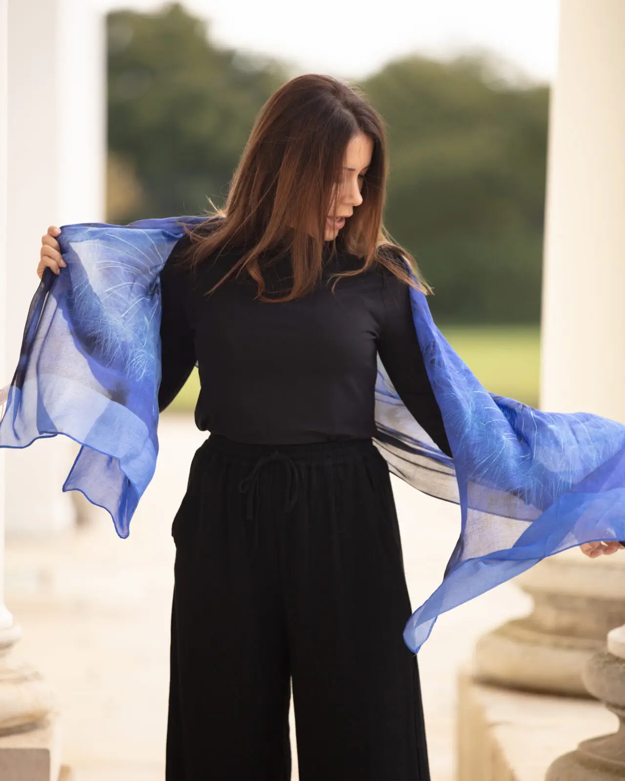 From My Mother's Garden Wishes Bamboo Scarf in a cobalt blue has a dandelion clock print