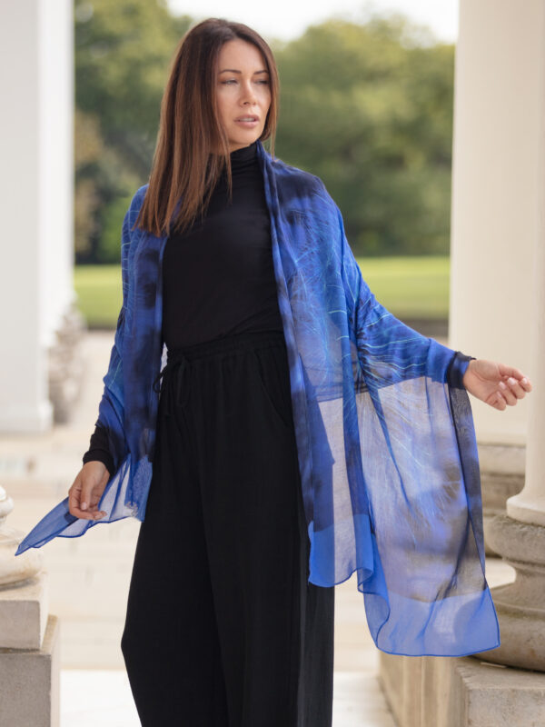 From My Mother's Garden Wishes Bamboo Scarf in a cobalt blue has a dandelion clock print
