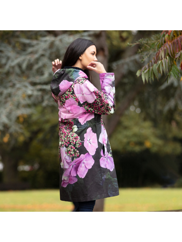 From My Mother's Garden Hydrangea Hooded Raincoat is a colourful outdoor jacket which will protect you from the rain