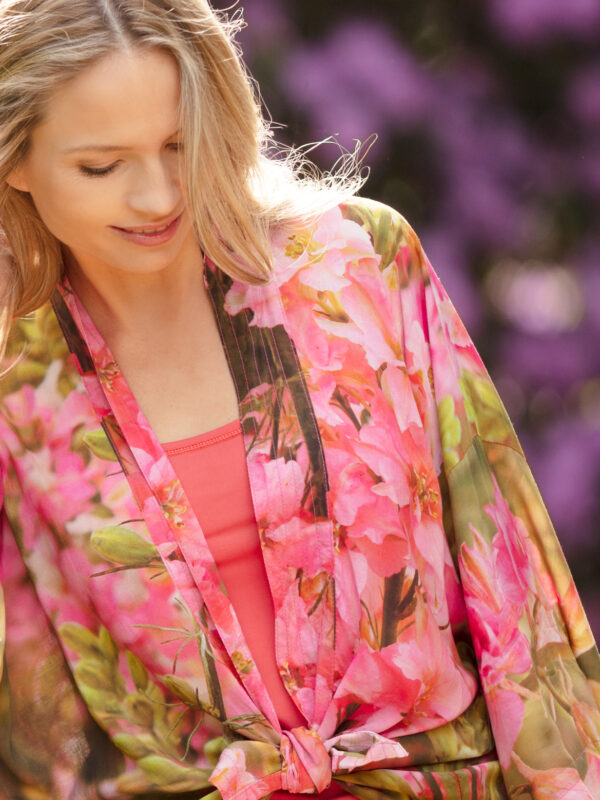 From My Mother's Garden Queen of the Border short kimono jacket in a silky smooth and sustainable fabric. It has a beautiful print of pink delphiniums