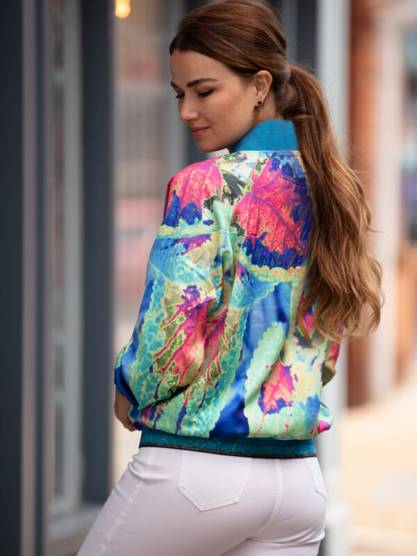 From My Mother's Garden fabulous satin bomber jacket in our exclusive aqua neon leaf print which wouldn't look out of place in Ibiza!