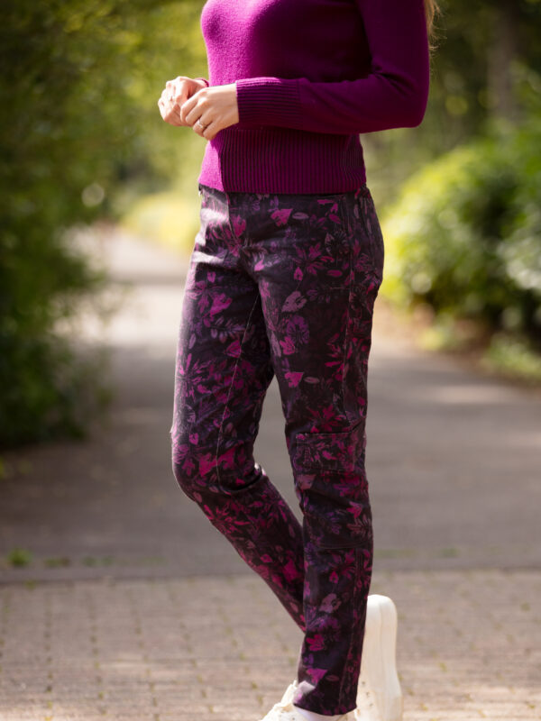 From My Mother's Garden Leaf Camo Trousers in stretch cotton. They are mid-rise and come in a plum camouflage print