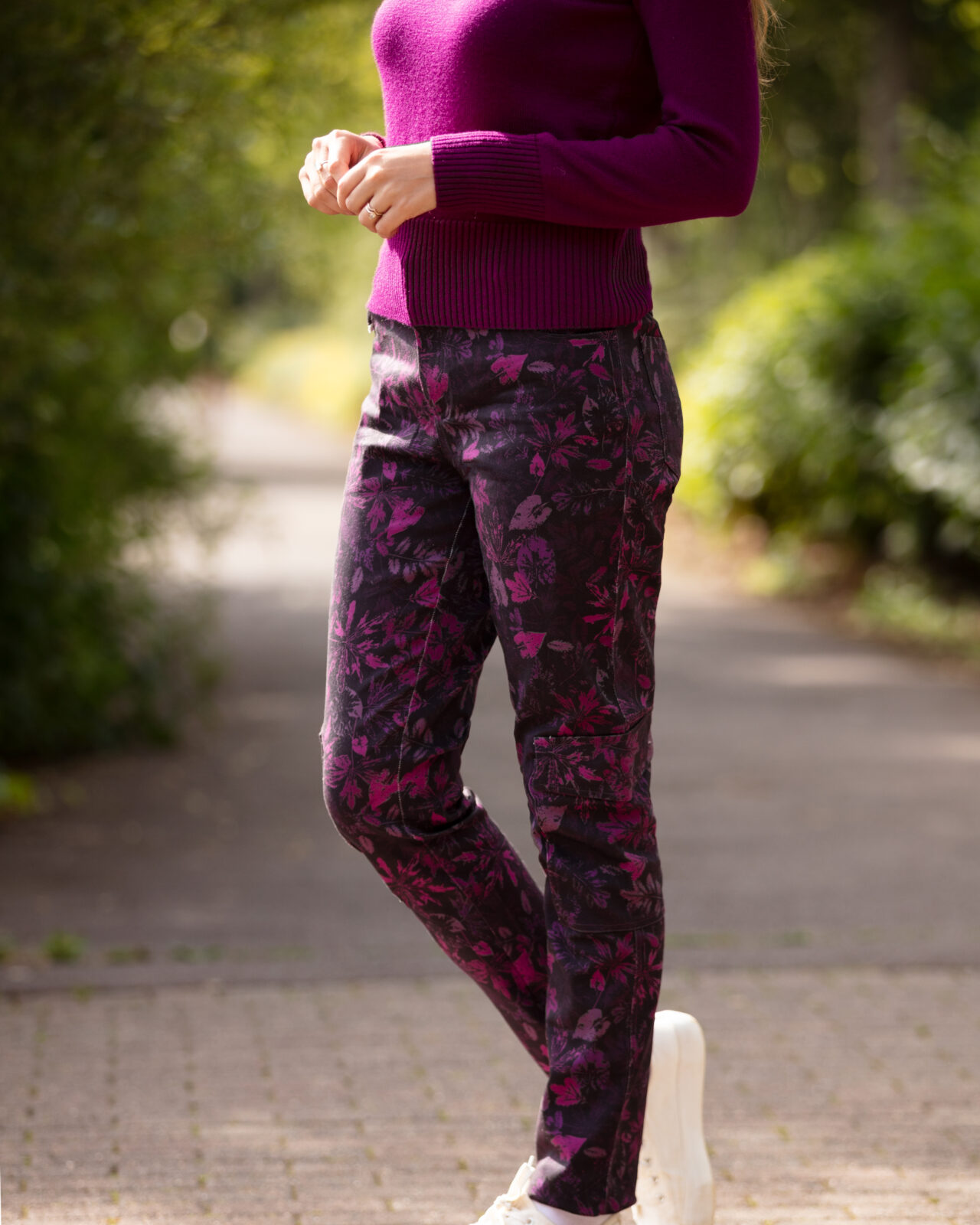 From My Mother's Garden Leaf Camo Trousers in stretch cotton. They are mid-rise and come in a plum camouflage print