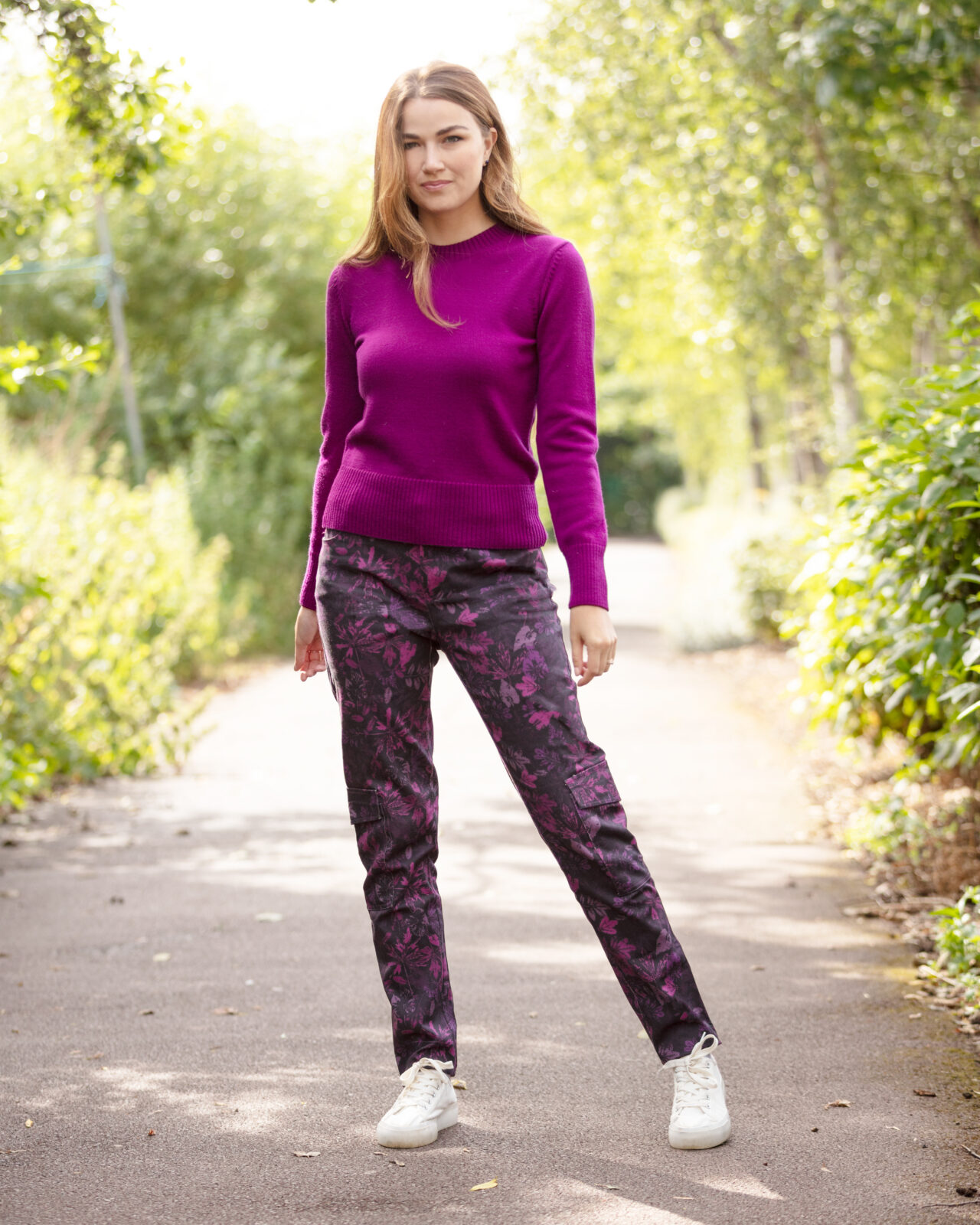 From My Mother's Garden Leaf Camo Trousers in stretch cotton. They are mid-rise and come in a plum camouflage print