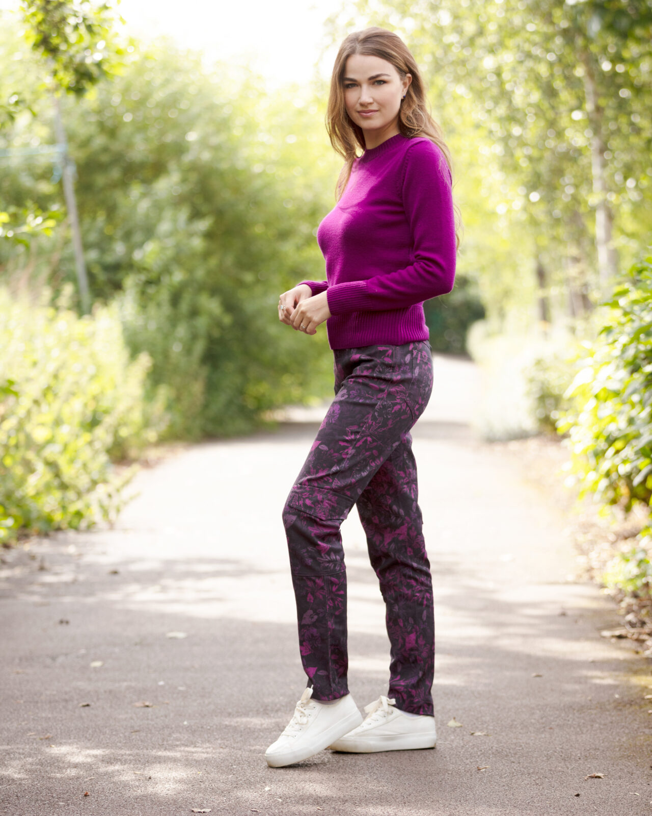 From My Mother's Garden Leaf Camo Trousers in stretch cotton. They are mid-rise and come in a plum camouflage print