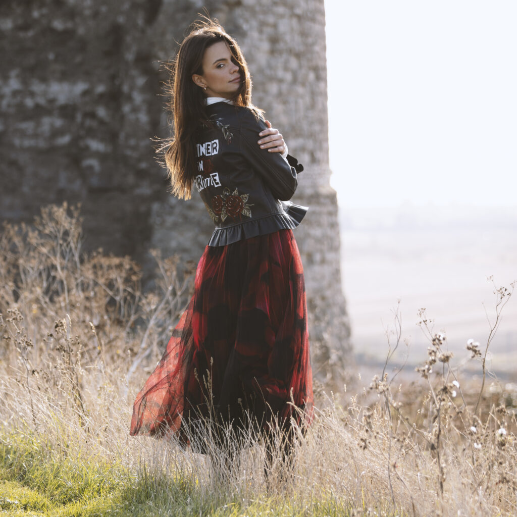 From My Mother's Garden photoshoot of the Petals Tulle Skirt with a SammyLeasRetro custom painted leather jacket