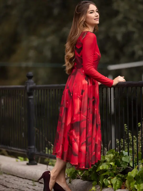 Petals Tulle Dress is a pretty and elegant party dress ideal for cocktail parties or a special occasion. The midi dress is red with a pretty floral print of dahlias. The Fit and Flare dress has semi sheer sleeves and a boat neckline. Perfect swish dress for dancing!