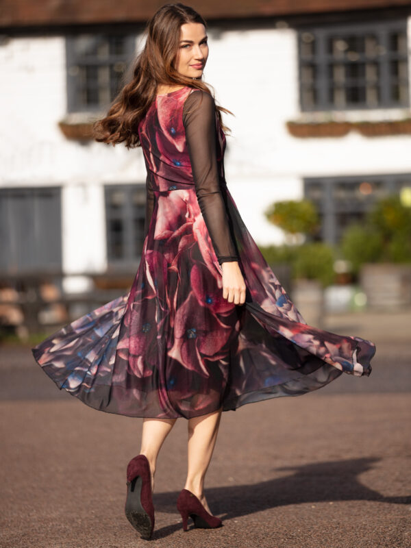 Jewel Hydrangea Tulle Dress is a pretty and elegant party dress ideal for cocktail parties or a special occasion. The midi dress is red with a pretty floral print of hydrangeas. The Fit and Flare dress has semi sheer sleeves and a boat neckline. Perfect swish dress for dancing!