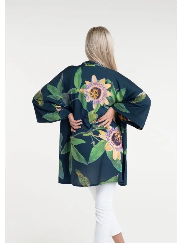 From My Mother's Garden Passionflower in Petrol is a mid-length kimono made of a silky, sustainable fabric