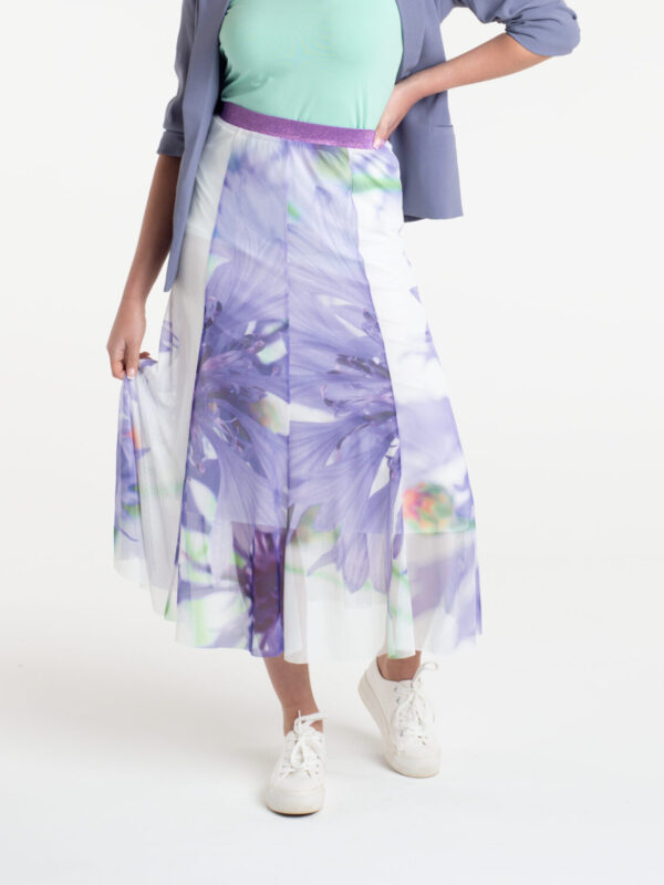 From My Mother's Garden Tulle Skirt in the Cornflower print is panelled so that it lies flat on the hips. It has an elasticated waist band