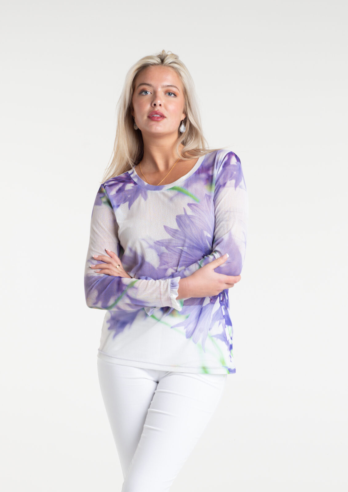 Cornflower Tulle Top by From My Mother's Garden is a pretty, feminine top with a scoop neckline and long sleeves. It has a Cornflower blue flower print on a white background