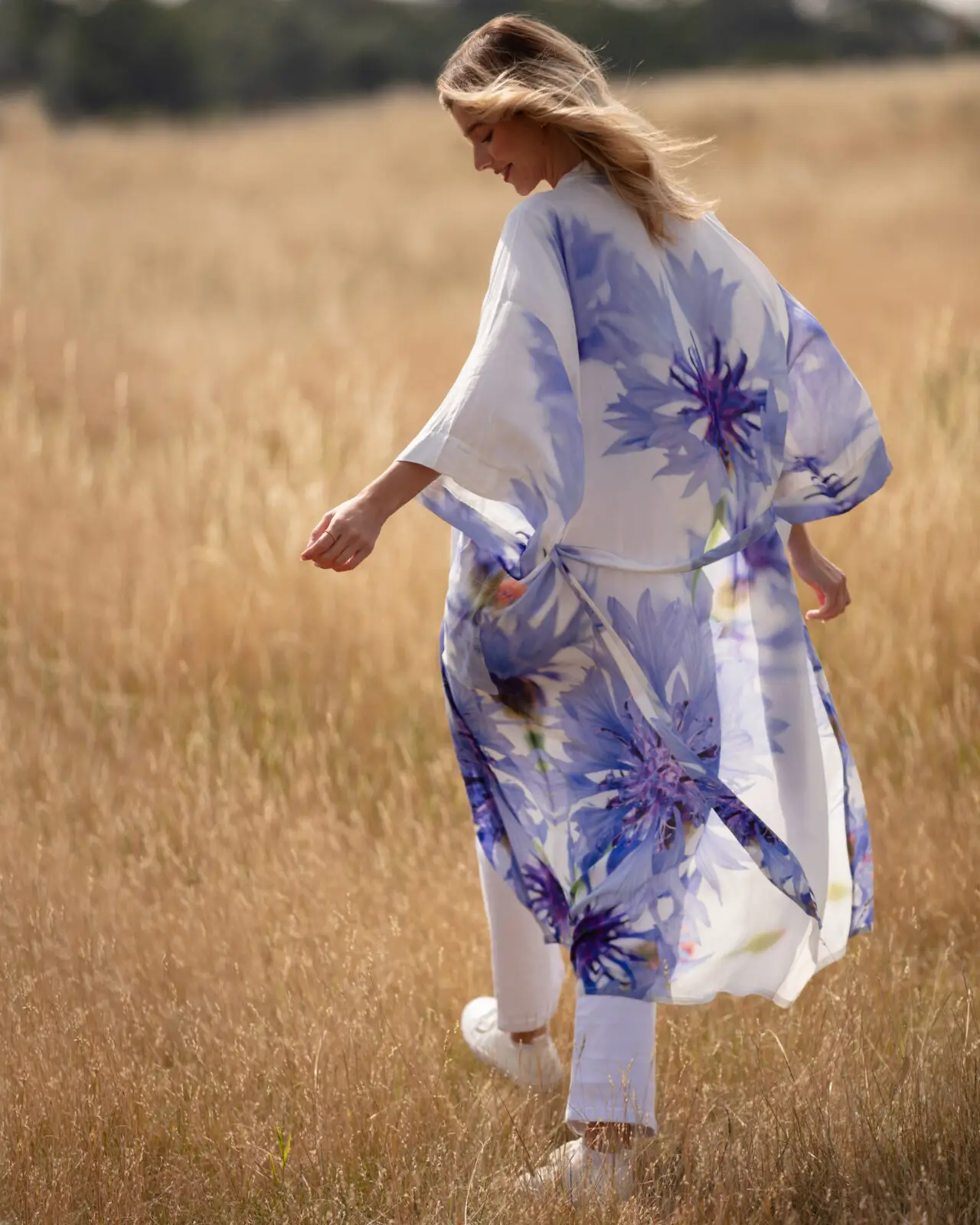 Cornflower Long Robe is beautifully feminine in a cornflower blue and white print. It can be worn as a dressing gown or a duster coat over trousers