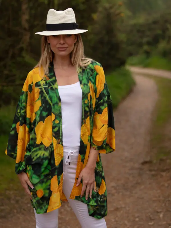 From My Mother's Garden Mid Length Kimono in the Buttercup print in yellow and green. A beautiful silky lightweight jacket that symbolises joy, friendship and happiness