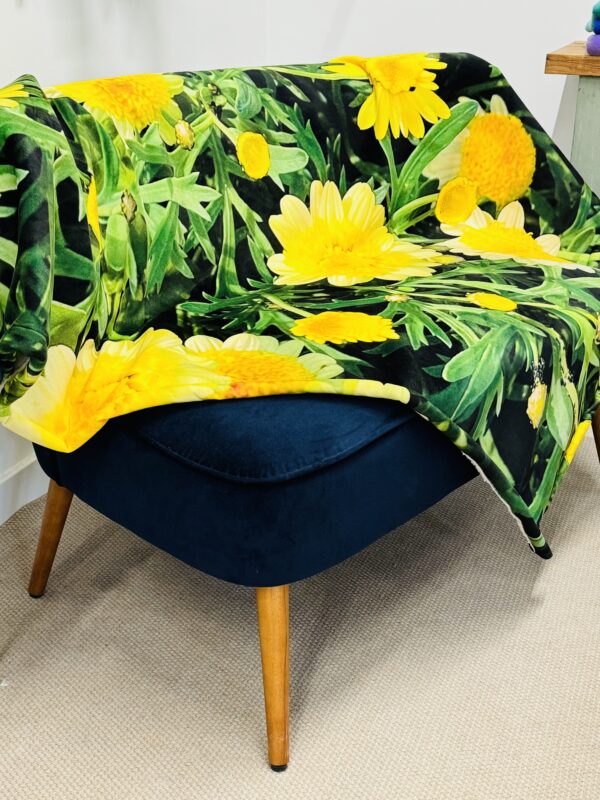 Daisy Fleece Throw 140 x 160cm by From My Mother's Garden. It has a fleece back