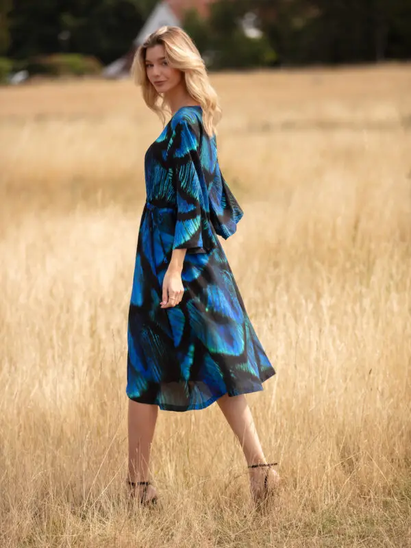 Stunning Peacock Dress by From My Mother's Garden is made of a soft draping crepe fabric. It has ties on either side to waist it if you want