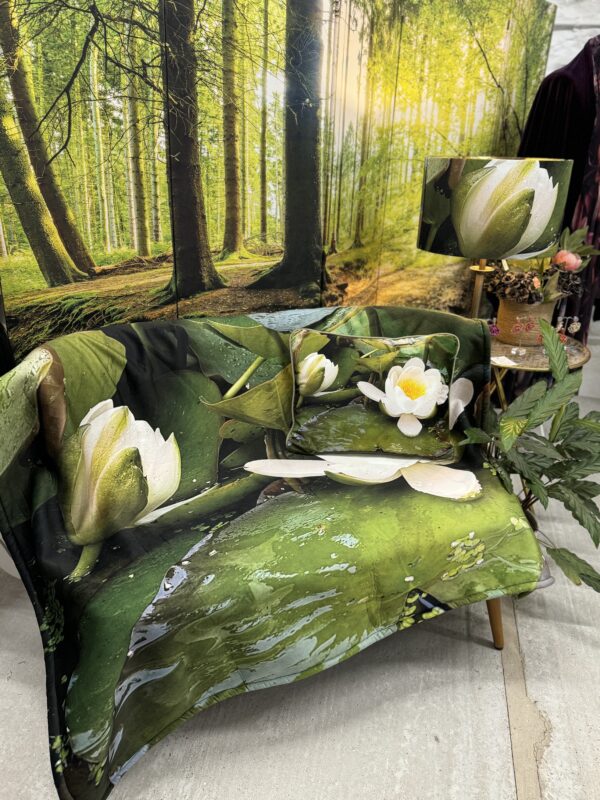 From My Mother's Garden Waterlily Fleece Throw is a soft blanket with a fleecy back