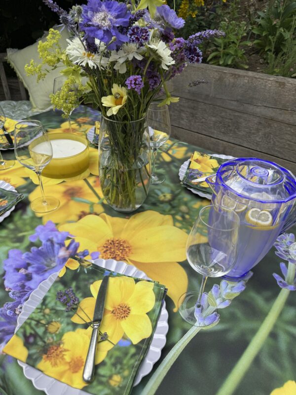 From My Mother's Garden Little Gem and Lavender Table Cloth is bright and happy. It is made from a heavyweight cotton drill