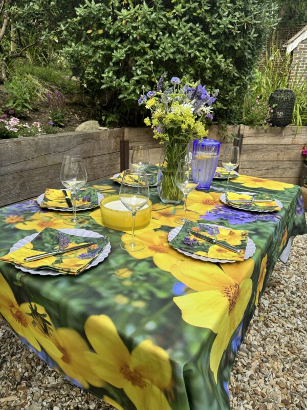 From My Mother's Garden Little Gem and Lavender Table Cloth is bright and happy. It is made from a heavyweight cotton drill