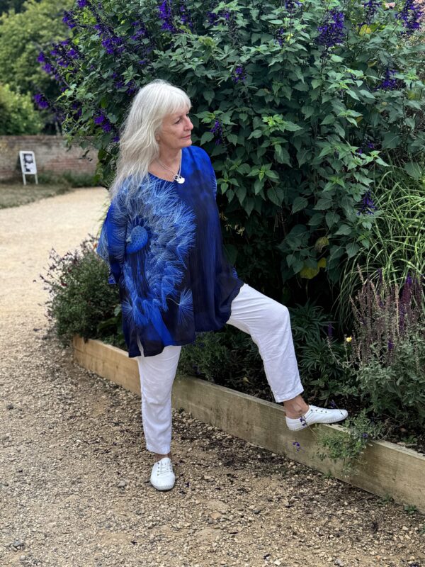 From My Mother's Garden Wishes Crepe Tunic Top is a wide, loose fit piece, perfect for when you're in a hot climate