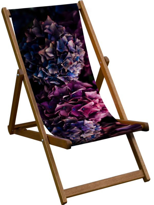 Luxurious hydrangea deckchair with durable sailcloth sling and solid birch wood frame. Handmade in the UK using FSC wood—bold, elegant outdoor seating
